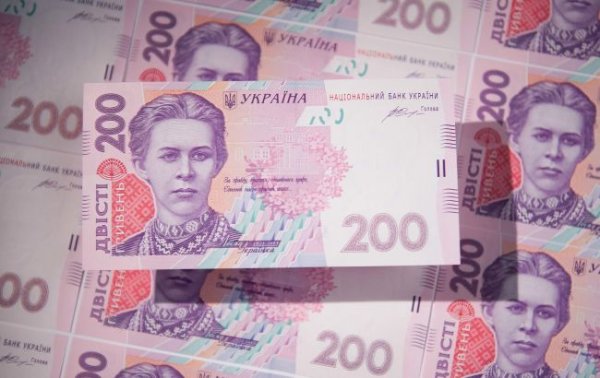 МВФ давит на Украину: Bloomberg узнал, почему фонд хочет девальвации гривны