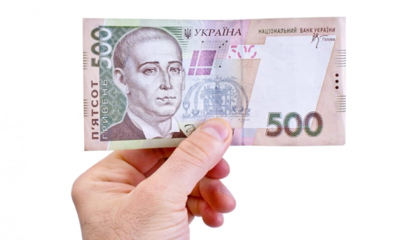 НБУ усилил гривну к доллару на 23 копейки: официальный курс
